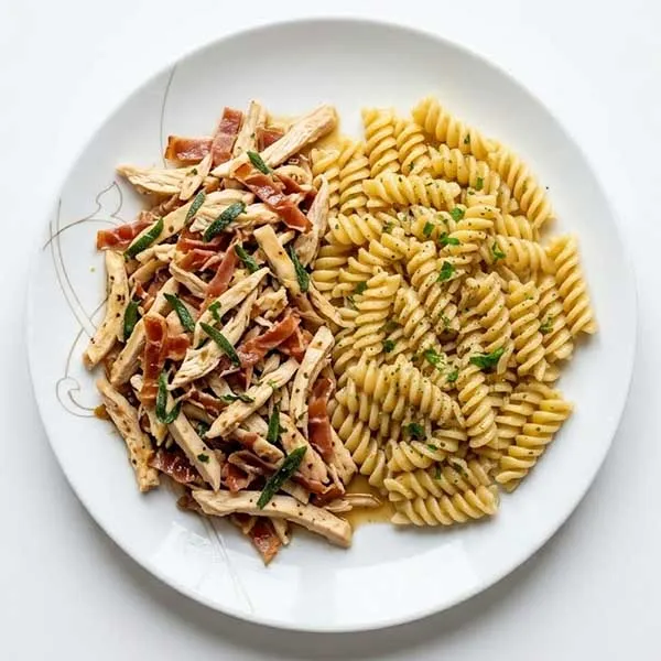 Italian saltimbocca chicken with fusilli pasta
